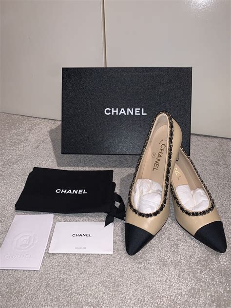 chanel beige and black shoes